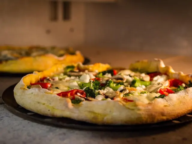 How to Reheat Pizza: 7 Easy Ways To Get Crispy, Melty Slices Today